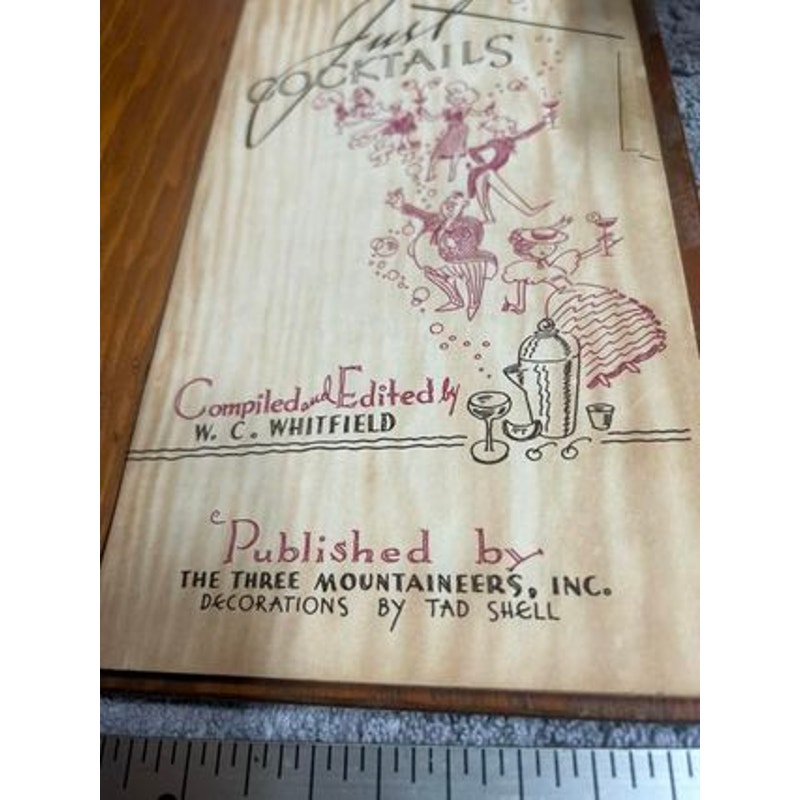 Just Cocktails bar recipe book with wood