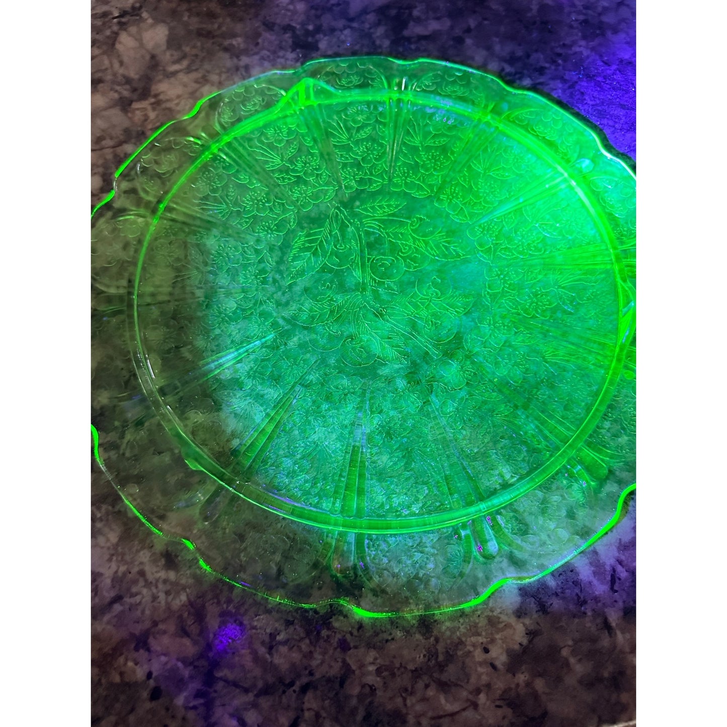 This beautiful Cake Plate is made out of depression/uranium glass.