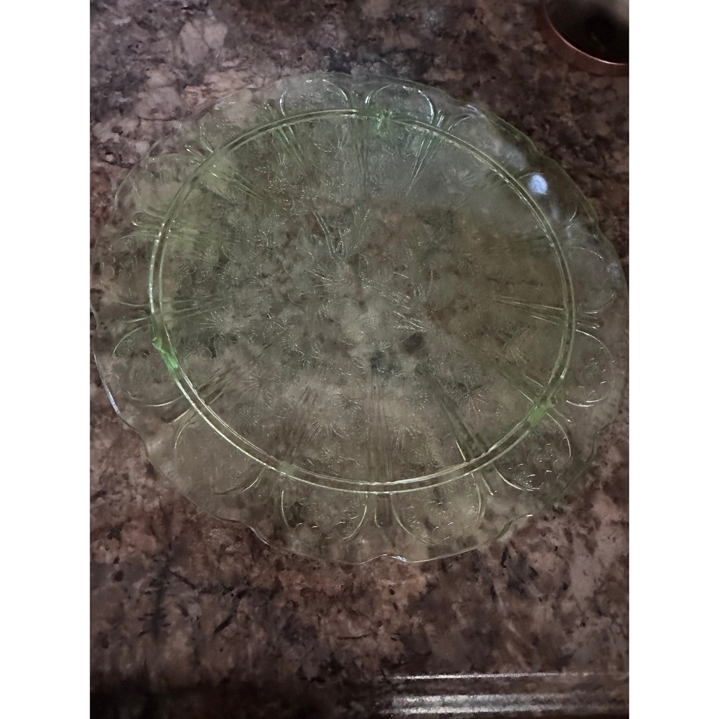This beautiful Cake Plate is made out of depression/uranium glass.