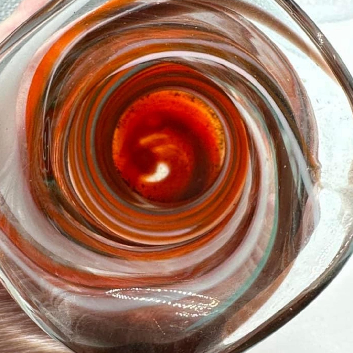 Beautiful hand blown swirl art glass vase. Measures 8x3