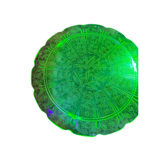 This beautiful Cake Plate is made out of depression/uranium glass.