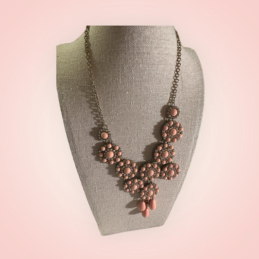 Mid-Century Pink Lucite, Clear Rhinestone and Gold Tone necklace.